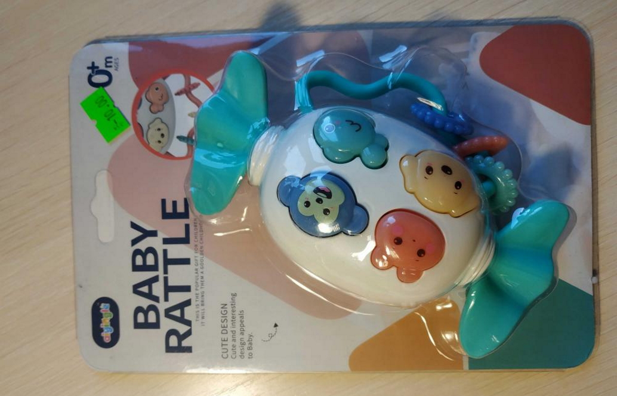 Игрушка детская с маркировкой «BABY RATTLE» «Музыкальная конфета» артикул 668-57